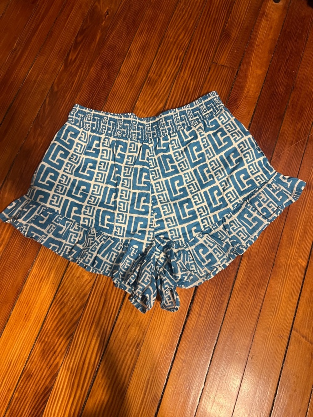 OLIVIA JAMES luxe Geo Print Ruffle Hem Women’s Shorts resort vacation stretchy M
